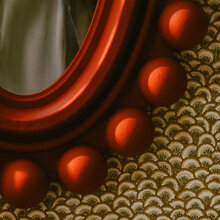 Mariella-porta-romana-väggspegel-spegel-zande-röd-detaljbild